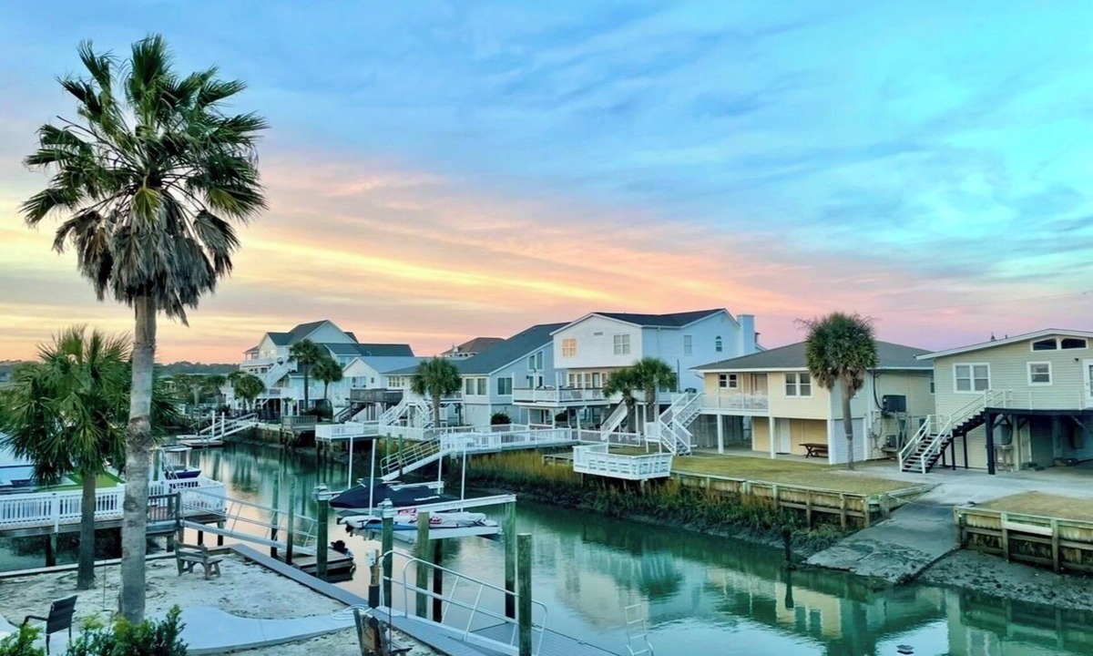 North Myrtle Beach Cottage | Fabulous 4-bedroom channel home with private dock in Cherry Grove Beach.