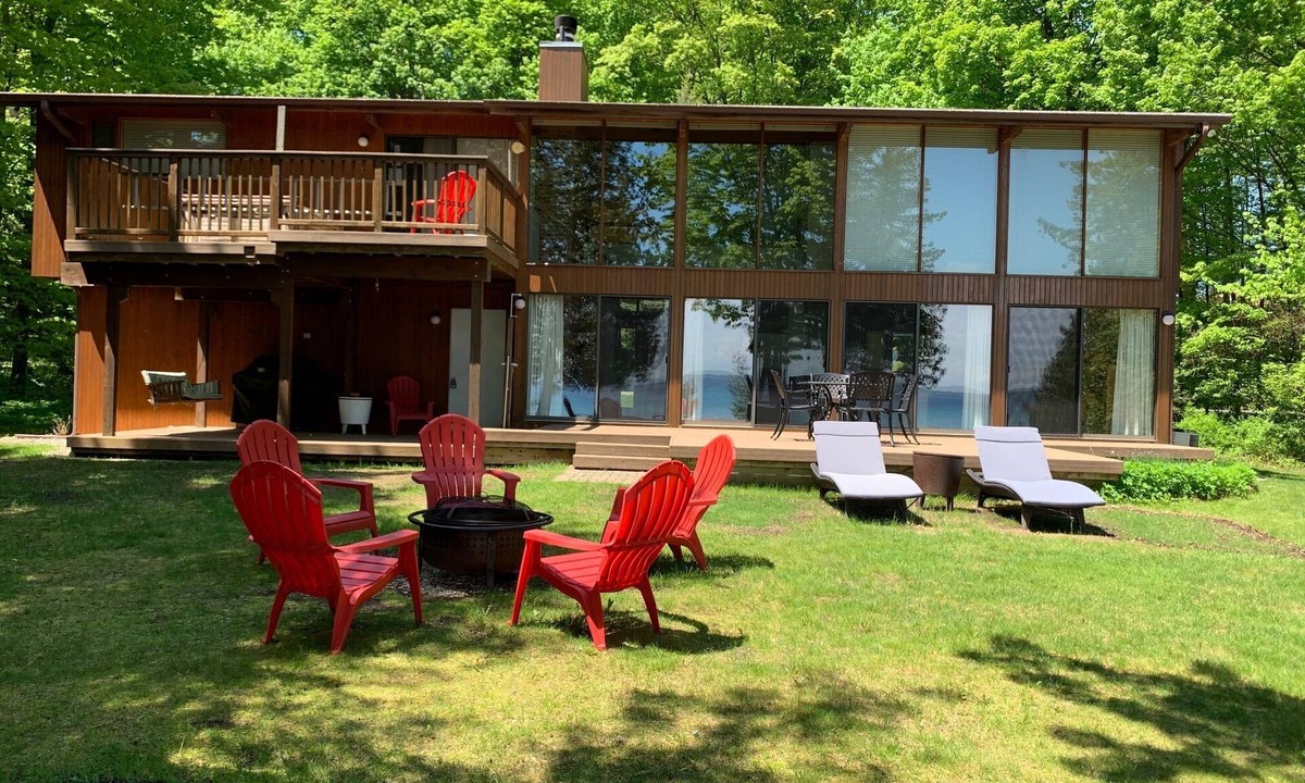 Suttons Bay House | Private Lakefront Suttons Bay Home with Hot Tub, Newly Renovated Beach and A/C!