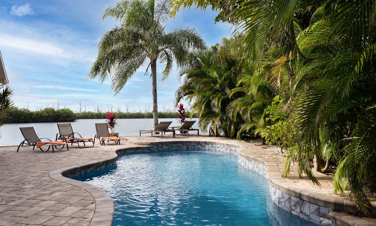 Sunnyland Beach House | Waterfront-Dolphins-Walk to Beach-Pool-Dock-BEAGLE POINT
