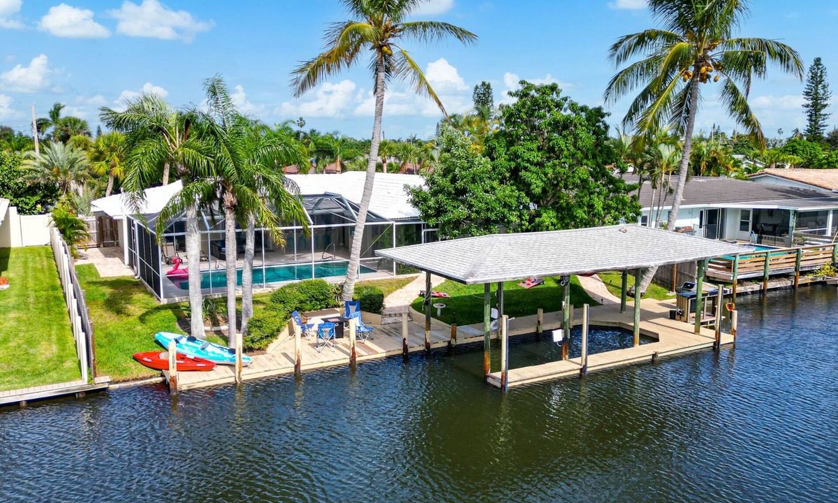 Venetian Way House | Waterfront Heated Pool w/Boat Dock & Cosmic Mini Gof - 4bd 2ba Paradise Found