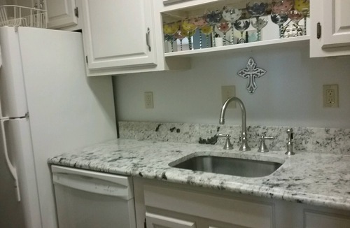 Faubourg Livaudais Condo | 3 Bed 2 Bath On St Charles With 2 Parking Spaces Across From Street Car Stop