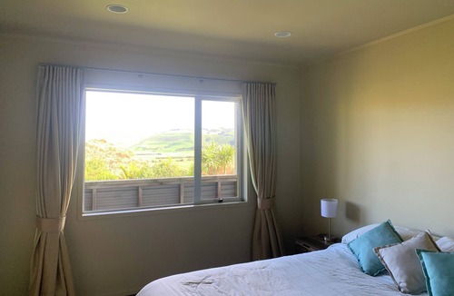 Awhitu House | A sunset paradise, 3 bedroom home on a hill with views to the ocean