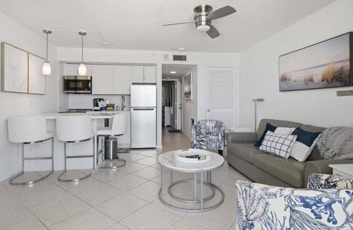 Marco Island Condo | Beachfront 1BR Apollo condo with pool, kitchen, and Gulf views.
