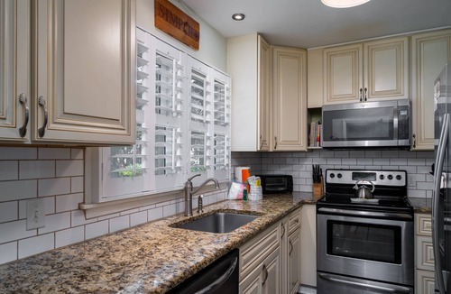 Tarpon Pond Cottage | Beautiful Cottage! Extra Full Bath! Golf Views! Amenity access included-2 dogs under 50# each