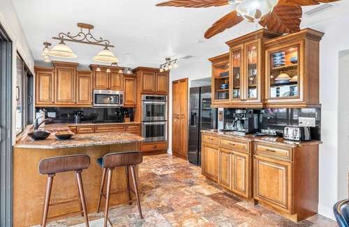 Cocoa Isles House | Canal Access: Boat Lift, Heated Pool & Dock