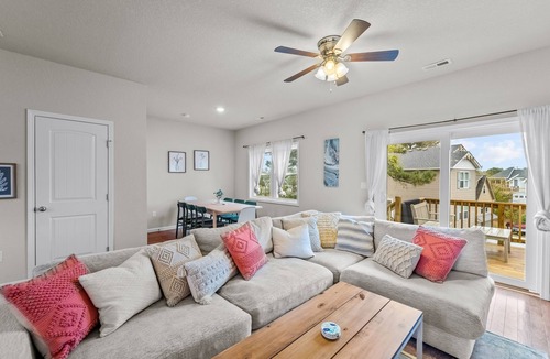 Colington Harbour House | Canal-view, dog-friendly home with private hot tub, deck & grill - near beach