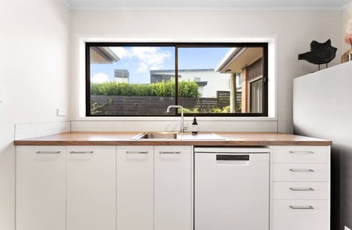 Rothesay Bay House | Charming single-level home - just moments from the beach, sun-soaked garden.