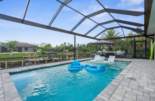 Pelican House | Coral Soleil Haus | Gulf Access, Heated Pool, Sunsets + Game Room
