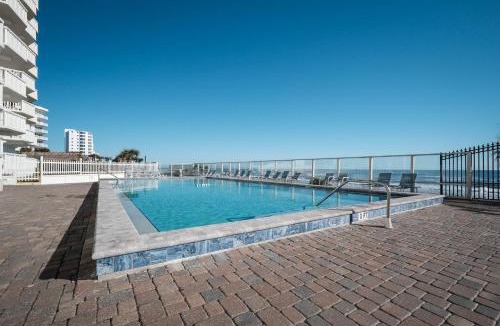 Ormond-by-the-Sea Apartment | Direct Oceanfront Corner Condo, Family-Friendly with Beachfront Pool and Garage Parking
