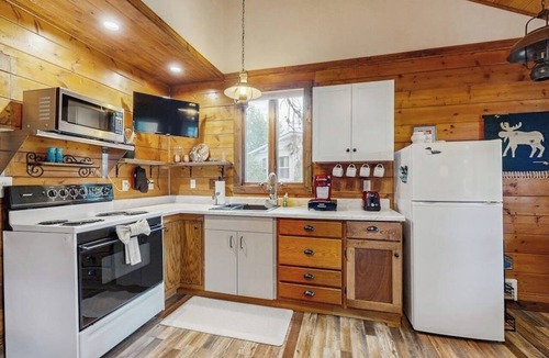 Woods Bay House | Enjoy two separate cabins, pet friendly, firepit, 5 min to Lake, fly-fishing