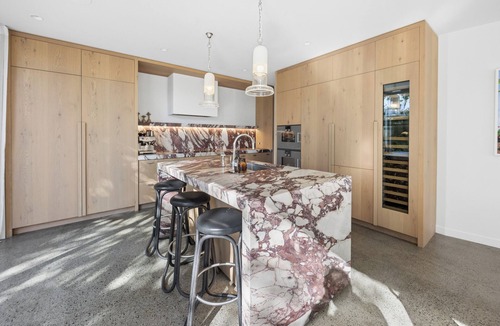 Ponsonby House | Experience luxury living in the heart of Ponsonby at this stunning four-bedroom retreat. Featuring a heated spa, swimming pool, sauna, beautiful gardens, outdoor fire, and expansive indoor-outdoor living, The Ponsonby Sanctuary is the perfect escape