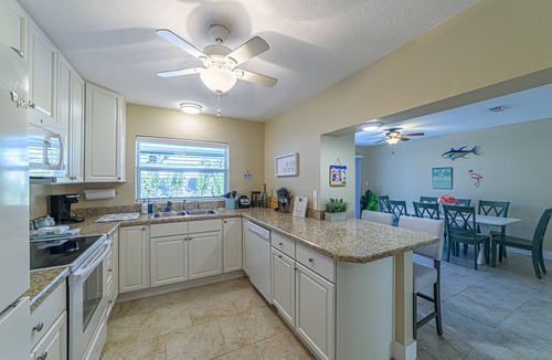 Cocoa Beach House | Family Fun! Steps to beach and Pier, Heated pool, hot tub, surf/bike/beach gear