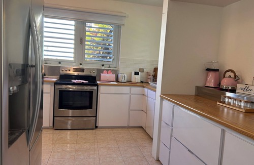 Miradero Apartment | First Floor Unit with big patio. Countryside steps away from beautiful beaches.