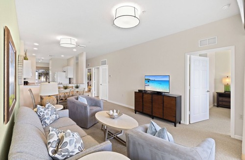 Naples Condo | Genoa Vacation Rental: Stylish 2-BR Condo with Golf & Lake Views. Resort-Style Pool, Hot Tub, and Easy Access to Championship Golf. Minutes from Naples Beaches, 5th Avenue S, and Marco Island