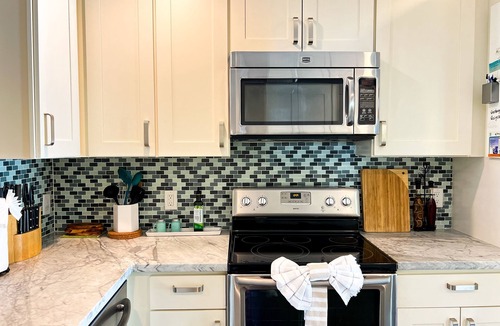 South Palm Park Neighborhood Association House | Lush Tropical Oasis! HEATED Pool, 1 mile to downtown, 2 miles to public beach