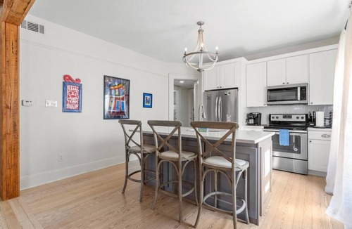 Uptown Historic District Apartment | Luxe 3BR on Magazine St with private pool & patio. Sleeps 6, walk to cafés, near FQ & Superdome.