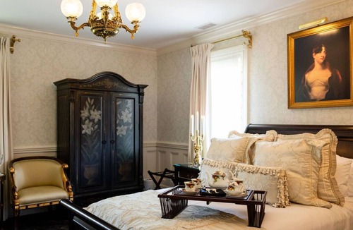 Thompson House | Luxury guest rooms in recently restored 1845 Gothic Revival Mansion.