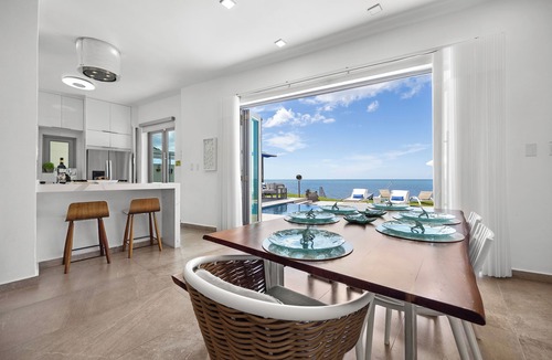 Guanajibo Villa | Luxury Ocean Front Villa with Heated Infinity Pool, Private Pier and Kayaks