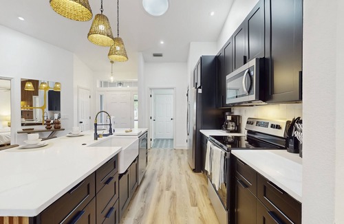 Melbourne House | Luxury Waterfront Escape with Heated Pool, Hot Tub, & Outdoor Patio! 🌊