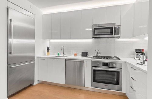 Tudor City Condo | Modern 1BR at 685 First Ave w Pool & Fitness Center
