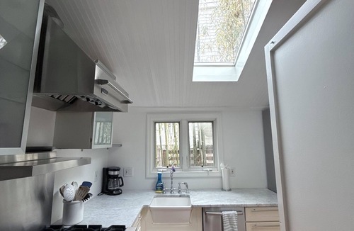 Westport Cottage | Nama-stay, sweet pink Saugatuck Shores beach cottage