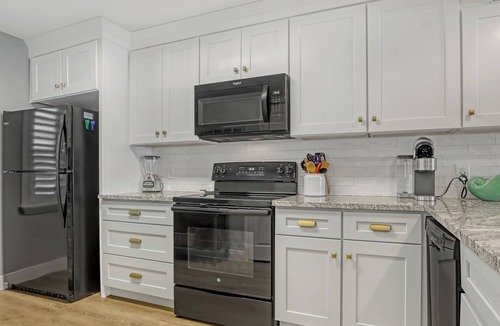Cocoa Beach Condo | Ocean View Steps From Beach! 75” TV Free WiFi & Movie