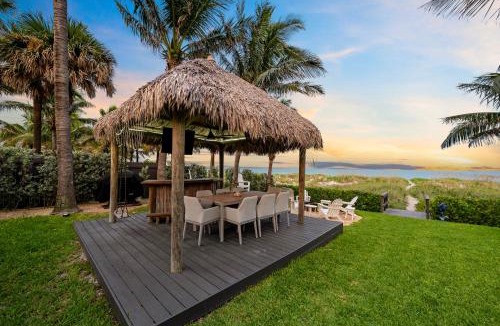 Cocoa Beach House | Oceanfront Cocoa Beach Vacation Home Private Beach, Tiki Bar & Family Fun