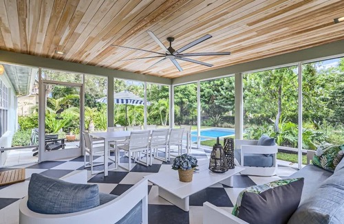 Parrot Cove House | Peacock Oasis - Retro Vibes and Poolside Lounging in Parrot Cove
