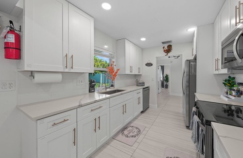 Riviera Beach House | Perfect for tournament teams, work crews, and family getaways, Sweet Pink offers a comfortable, peaceful stay designed to feel like your home away from home.
