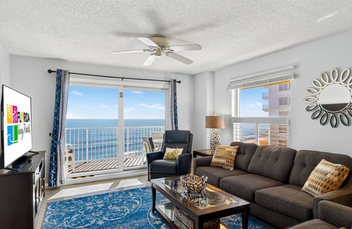 Seawinds Condo Condo | Pet friendly, direct oceanfront corner 2/2 with spacious balcony and heated beachfront pool