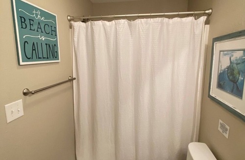 Kill Devil Hills Apartment | PRIVATE King Suite, POOL, GRILL,outdoor shower,coffee bar,fridge,microwave