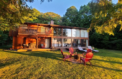 Suttons Bay House | Private Lakefront Suttons Bay Home with Hot Tub, Newly Renovated Beach and A/C!