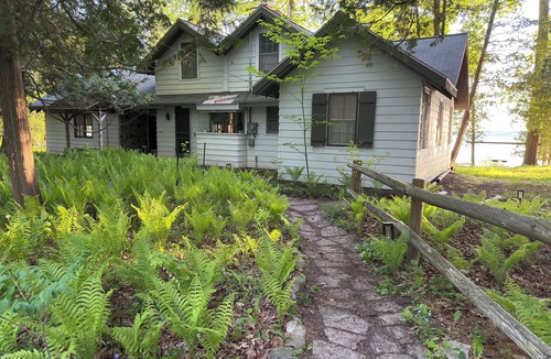 Alden Cottage | Private Sandy Beach on Torch Lake Cottage + Guest House Walk to Alden
