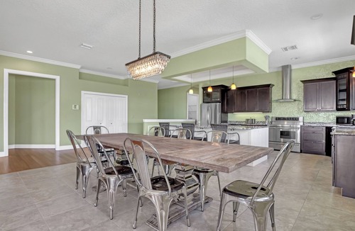 Tropic House | Riverfront Family Pool/Spa Game Rm 8bd/5.5ba 20ppl