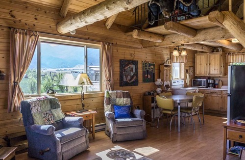 Whitehall Cabin | Romantic Cabin Rental with a Delightful Porch near Ennis, Montana