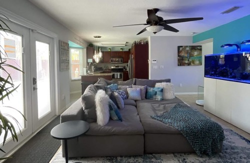Tropic House | Space Coast Oasis Solar Heated Pool, Hot Tub, Movie Theater & Aquarium