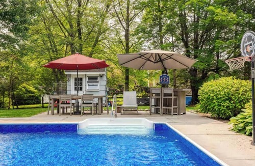 Norwalk House | Spacious 4-bedroom house with AC in tranquil Norwalk. Year round hot tub. Pool