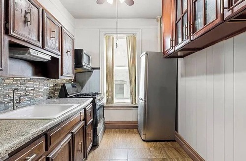 East Flatbush House | Spacious Brooklyn 4BR/2BA Across 2 Private Floors with Yard