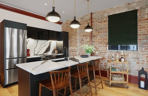 Faubourg Lafayette Hotel | The Gisele: 4BR/4BA for 8 | Pool + Streetcar Stop