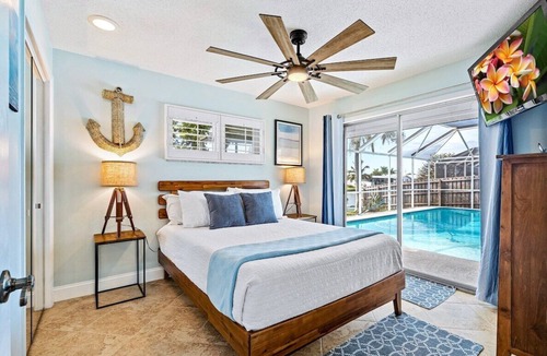 Venetian Way House | This house is a 4 bedroom(s), 2 bathrooms, located in Cocoa Beach, FL.