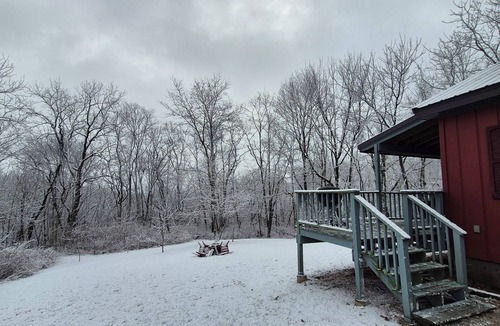Savanna Cabin | Tranquil red cabin at River Rail Retreats at palisades