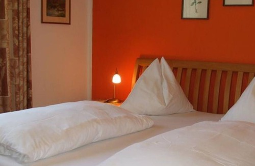 Ossiach House | Triple room with balcony and lake view - Hotel-Pension Brönimann