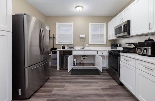 Hartford House | Urban 2-Story Remodeled Townhouse Retreat