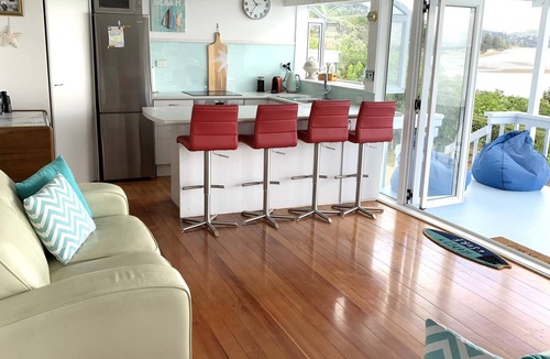 Red Beach House | Vintage Retro style Bach with stunning sea views