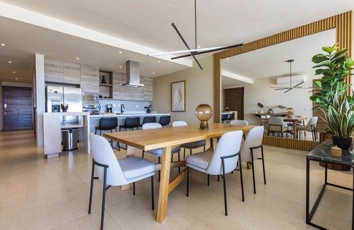 Juarez Condo | Vista Del Arco at Vista Vela Sunset is a modern 3-bedroom condo with ocean and sunset views, an open layout, and top resort amenities. Enjoy pickleball courts, a fully equipped gym, and a pool just steps from the patio—ideal for a relaxing Cabo stay.
