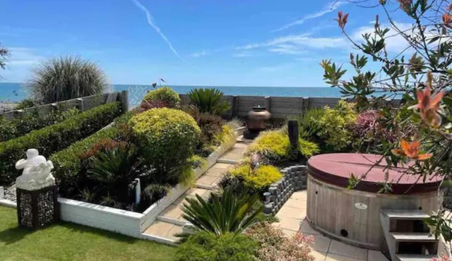 Absolute Beachfront Oasis with Sea Views & Hot Tub