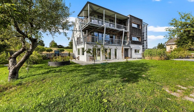 Flat Residence Aichwaldsee 2 with private axxess to the lake and a private beach
