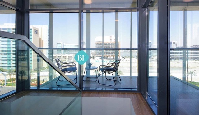 Bloomfields Modern 2BR Duplex in Raha Lofts