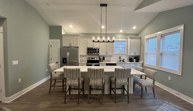 Brand New Single Level Condo, Steps from the Beach