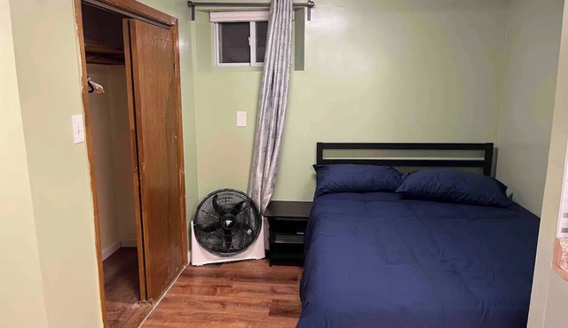 Charming 1-bedroom basement apartment in Floral Park with WiFi and AC